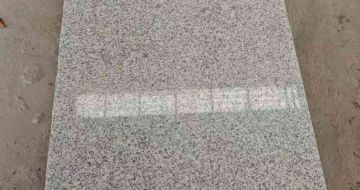 曲靖芝麻白光面毛板